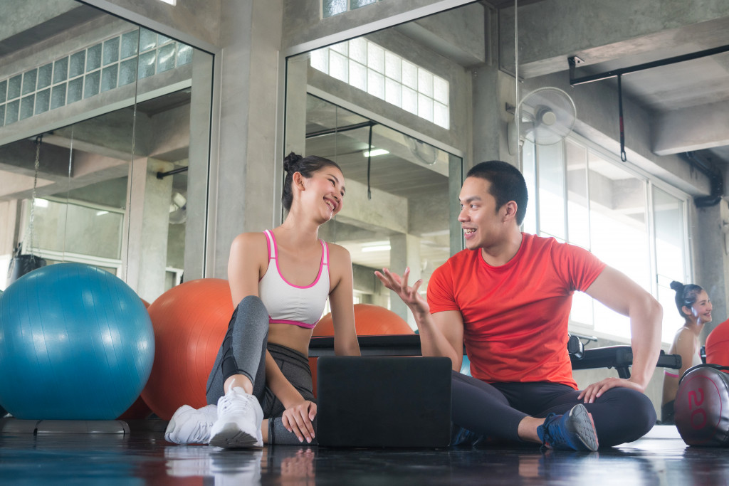 two people planning a fitness business