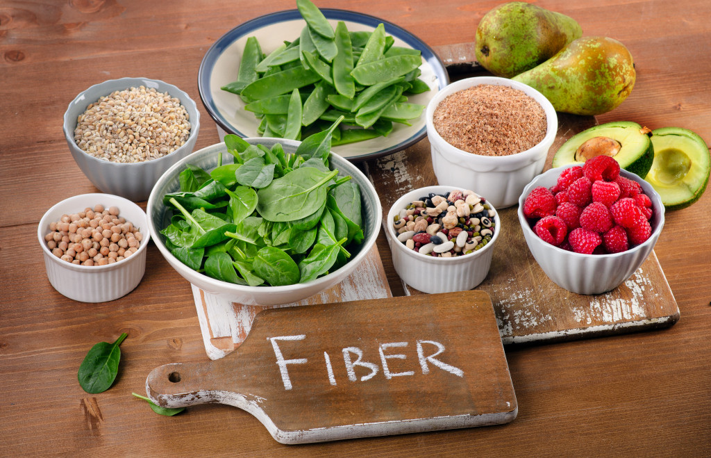 Foods rich in Fiber on a wooden table.