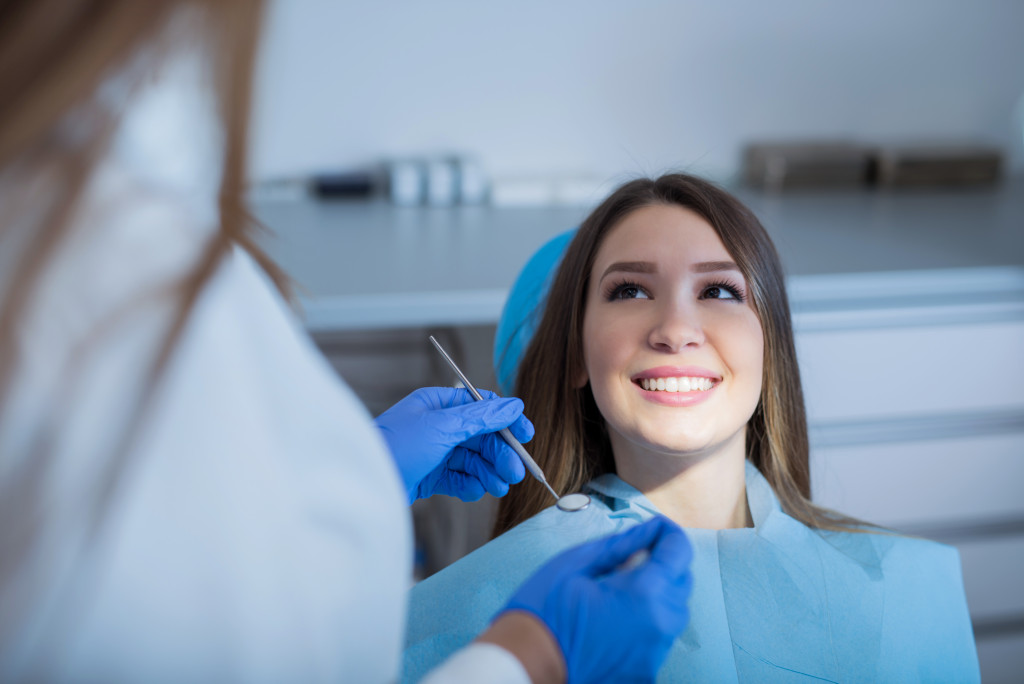 An employee getting a dental checkup