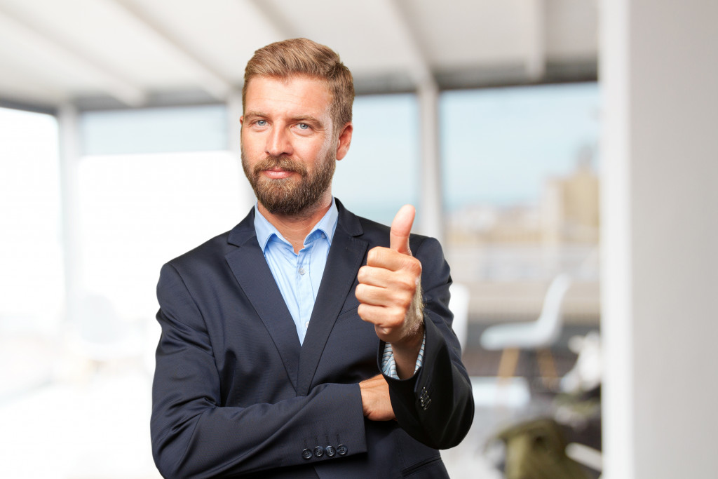 entrepreneur giving thumbs up