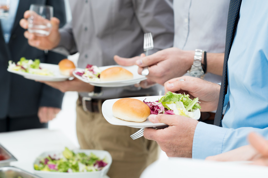 employees with healthy meals on their plate
