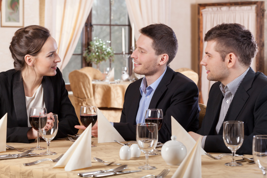 Company leaders taking client to fancy restaurant